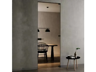 Porta Filomuro Battente in vetro Bronzo di BiHome
