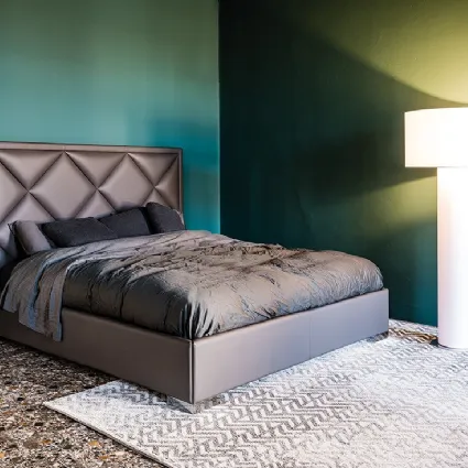Letto contenitore in ecopelle con testiera lavorata a rombi Patrick di Cattelan Italia