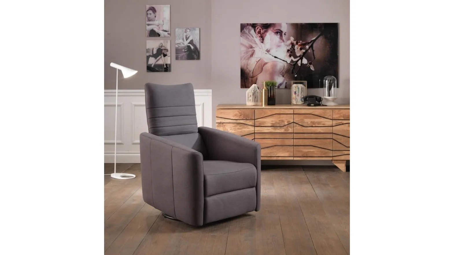 Poltrona relax Magic in ecopelle con base cromata girevole di Stones